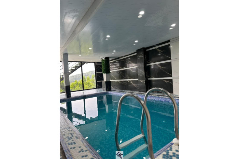 کلبه سوئیسی استخردار اهورا در بابلکنار